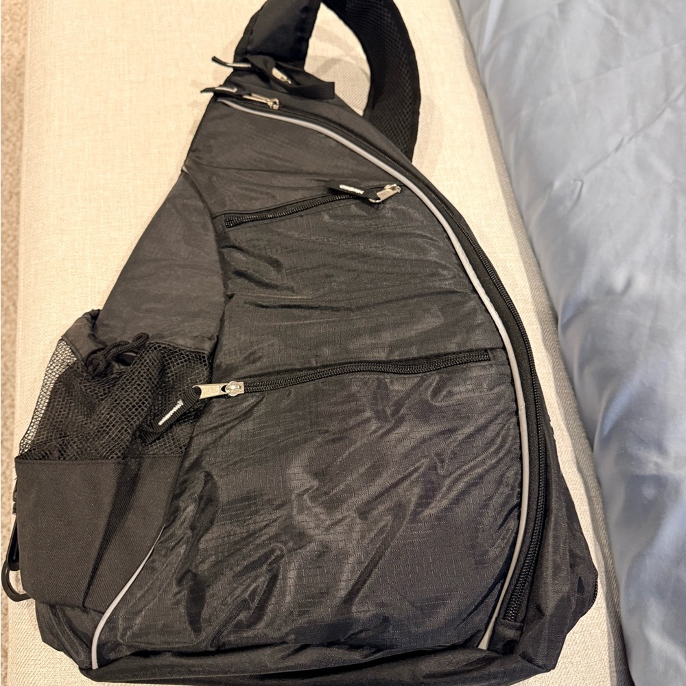 Sleek Black Sling Backpack